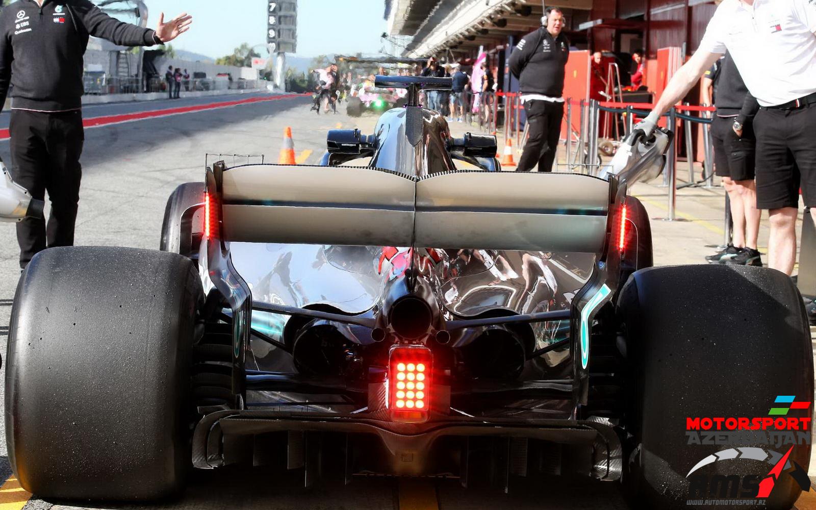 Mercedes with red led lights on the rear wing