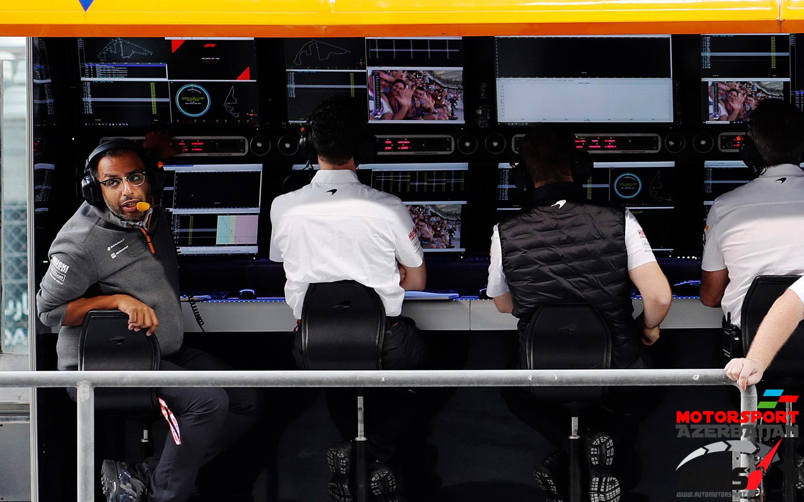 Randeep Singh, left, is one of four in McLaren's strategy team